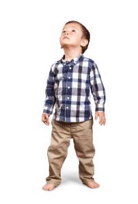 asian boy looking up white background
