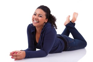 diverse happy woman on floor