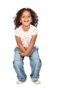 cute girl sitting white background