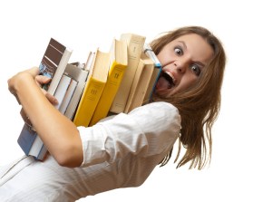 stressed student with books